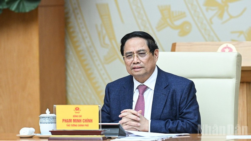 范明正总理在会上发言。（本报记者 陈海摄）