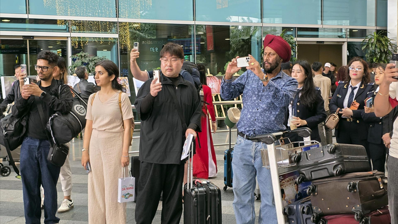 岘港国际机场的国际旅客。（图片：越通社）