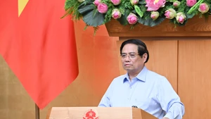范明正总理发表讲话。