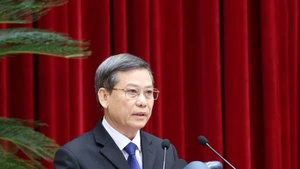 越共中央书记处书记、中央内政部常务副部长黎明智。