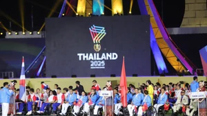 出席开幕式的越南残疾人体育代表团。（图片来源：越通社）