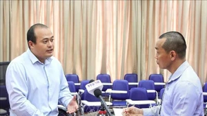 金边皇家大学国际安全与公共政策研究院研究员通·孟格达维德(Thong Mengdavid)接受越通社记者采访。（图片来源：越通社）