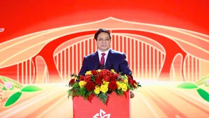 越南政府总理范明正在2026年春季博览会闭幕式上发表讲话。（图片来源：VGP）