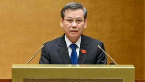 最高人民法院院长黎明智在会上作出2021—2026年任期最高人民法院工作报告。（维灵 摄）
