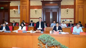 越共中央书记处常务书记陈锦秀在会上致辞。（登科 摄）