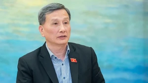 国会常委会委员、国会科技与环境委员会主任黎光辉。
