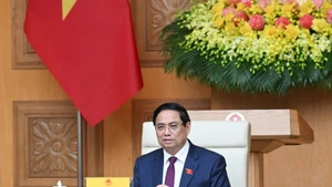 范明正总理在会上致辞。（陈海 摄）