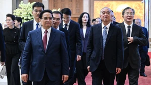 范明正总理和中国山东省委书记林武。