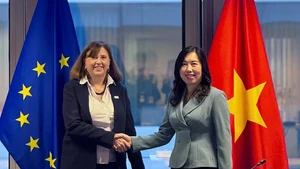 越南外交部副部长黎氏秋姮与欧盟对外行动署亚太总局代理总司长葆拉·潘帕洛尼。