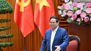 范明正总理在会上发表讲话。（陈海 摄）