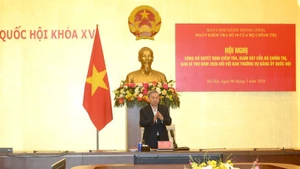 苏林总书记在会议上发表讲话。（登科 摄）