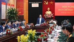 范明正总理在会上发表讲话。（陈海 摄）