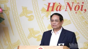 范明正总理在会上发表讲话。（陈海 摄）