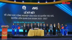 合作协议签约仪式现场。（图片来源：越通社）