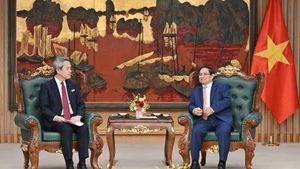 越南政府总理范明正会见日本丸红株式会社社长大本晶之。