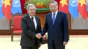 越共中央总书记苏林和联合国秘书长安东尼奥·古特雷斯。