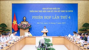 范明正总理主持召开COP26指导委员会第四次会议。（图片来源：VGP）