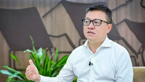 越共中央委员、《人民报》社总编辑、中央宣教与民运部副部长、越南新闻工作者协会主席黎国。（图片来源：越通社）
