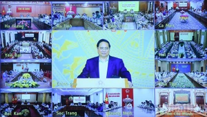 会议通过线上线下的相结合方式举行，设在政府总部的会议主会场与63个中央直辖省市的分会场连线。（陈海 摄）