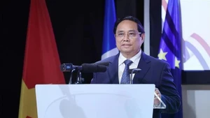 越南政府总理范明正出席越法企业论坛。