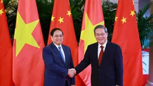 越南政府总理范明正与中国国务院总理李强。