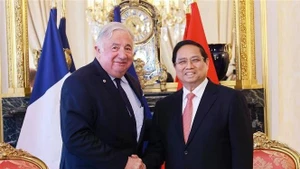 范明正总理会见法国参议院议长热拉尔·拉尔歇。