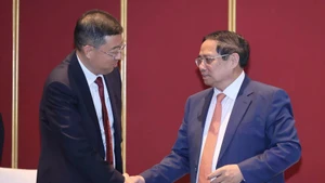 范明正总理会见中国银行（BOC）董事长葛海蛟。