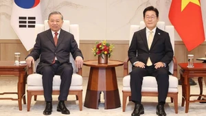 越共中央总书记苏林和韩国总统李在明。（图片来源：越通社）
