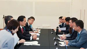 双方会晤现场。（图片来源：越通社）