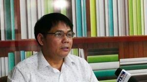 在老越资企业协会副主席黄文军。（图片来源：越通社）