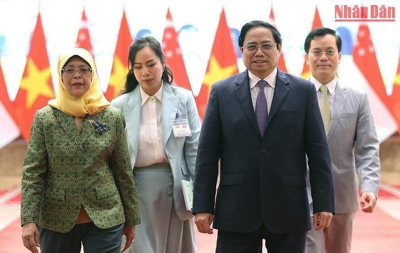 越南政府总理范明正与新加坡总统哈莉玛·雅各布。