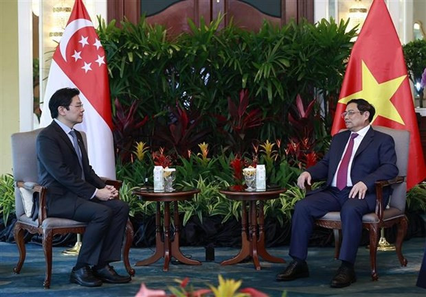 越南政府总理范明正会见新加坡副总理黄循财。 越南政府总理范明正会见新加坡副总理黄循财。