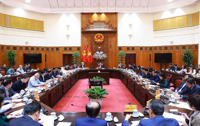 范明正总理主持会议。(图片来源:越通社) 范明正总理主持会议。(图片来源:越通社)