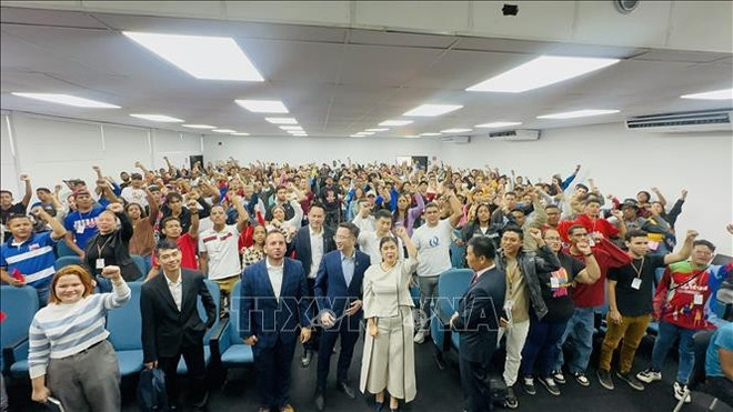 越南—委内瑞拉青少年交流活动现场。(图片来源:越通社) 越南—委内瑞拉青少年交流活动现场。(图片来源:越通社)