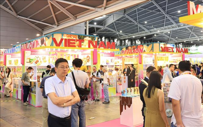 越南在新加坡亚洲食品与饮料展上大放异彩。(图片来源:越通社) 越南在新加坡亚洲食品与饮料展上大放异彩。(图片来源:越通社)