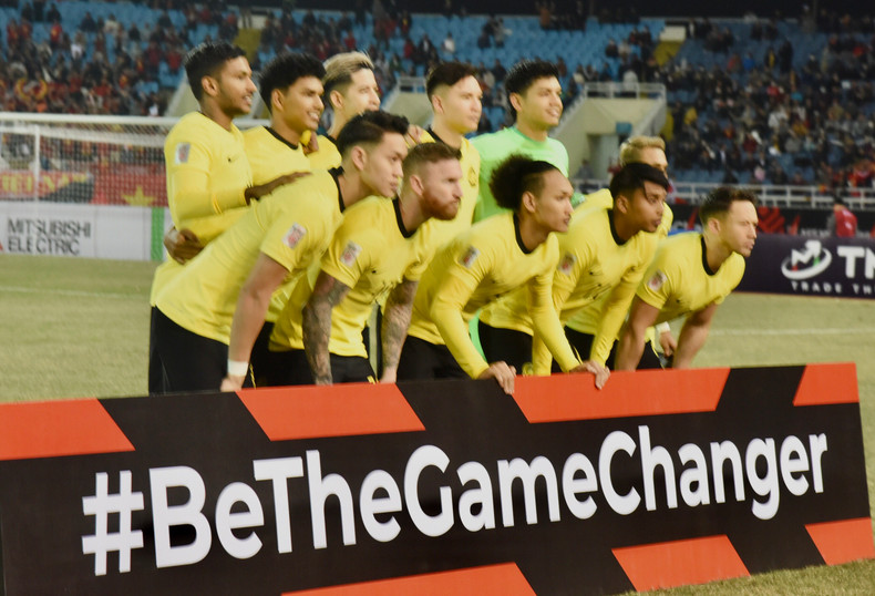 马来西亚队赛前合影。