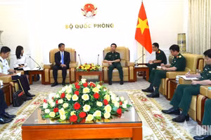会见场景。（图片来源：qdnd.vn）