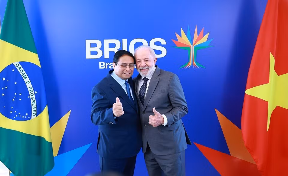 越南政府总理范明正会见巴西总统卢拉·达席尔瓦。（图片来源：越通社）