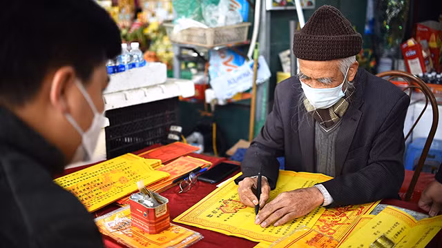 河内人正月十五出去烧香拜佛 祈求平安（组图） ảnh 6