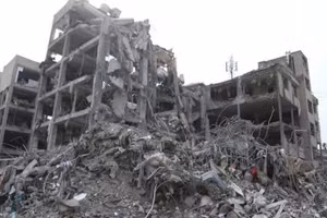 3月12日，伊朗德黑兰遭到空袭，该建筑被摧毁。（图片来源：新华社/越通社 发）