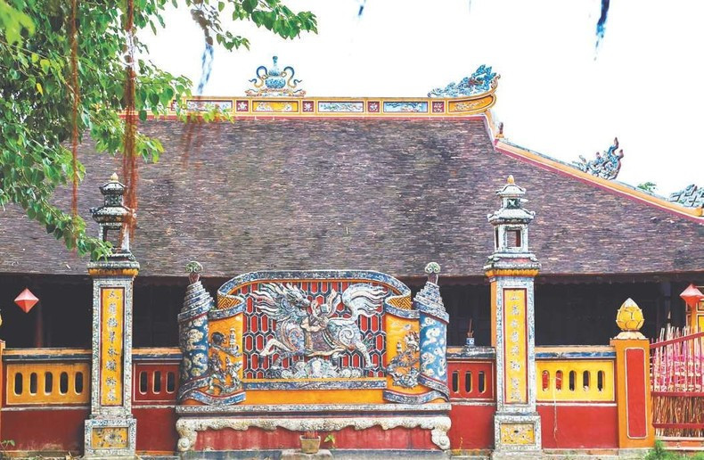 经年不衰的金龙祠壁画影壁。