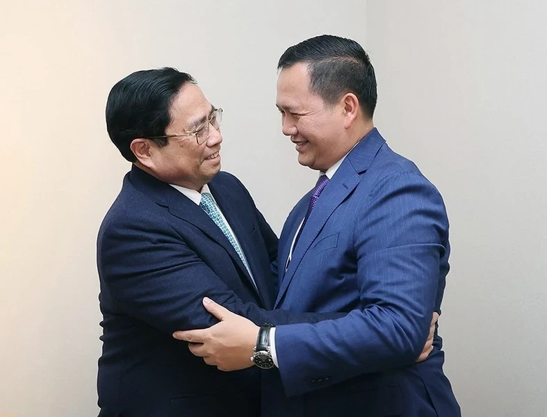 越南政府总理范明正和柬埔寨首相洪玛奈。（图片来源：越通社）