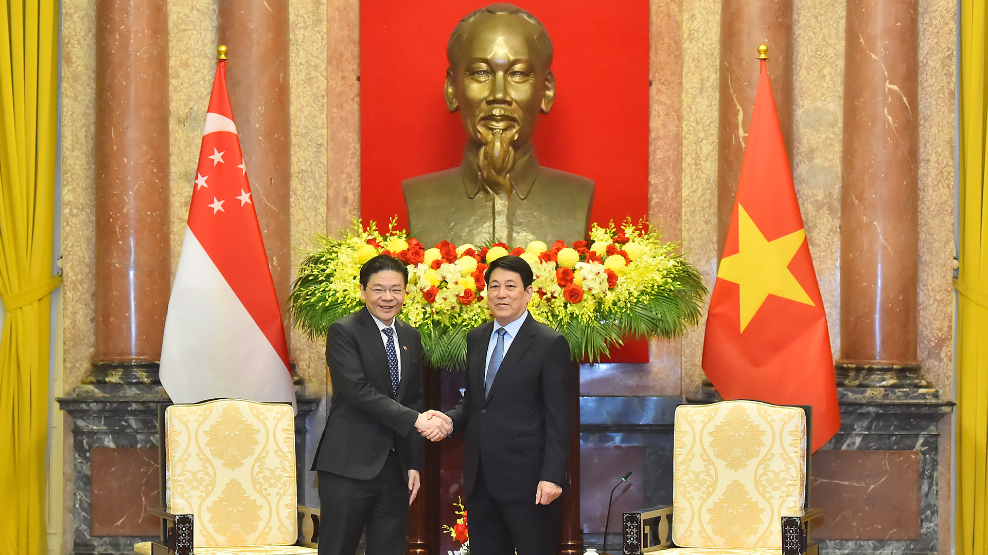越南国家主席梁强会见新加坡总理黄循财。