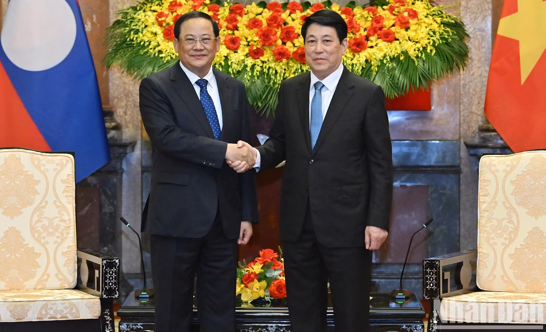 越南国家主席梁强与老挝政府总理宋赛·西潘敦。