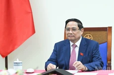 范明正总理与俄罗斯国家原子能集团公司总经理通电话。