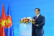 范明正总理在会议上致辞。（陈海 摄）