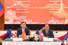 阮文隆上将和坎金·富拉玛尼翁上将共同主持会议。