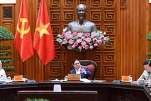 范明正总理主持会议。