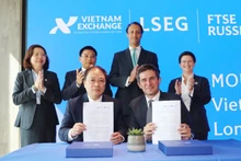 越南证券交易所与富时国际有限公司签署合作备忘录。（图片来源：越通社）