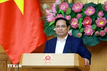 范明正总理在会议上发表讲话。（图片来源：越通社）